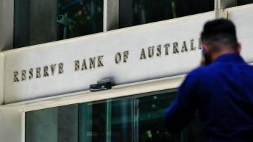Australian central bank decides first rate hike in 11 years