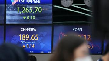 Asian stocks rise after Fed chair downplays bigger rate hike