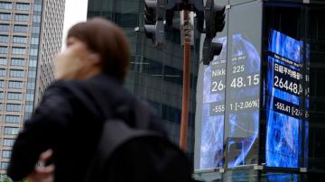 Asian shares mostly fall as rate hikes, China slowdown loom