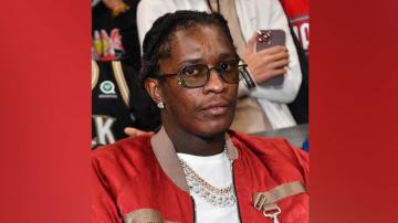 Rapper Young Thug hit with gang-related charges in sweeping indictment
