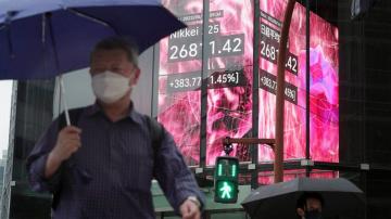 Asian shares mixed as markets eye US interest rates, prices