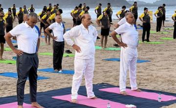 Watch: Rajnath Singh Participates In Yoga Session With Navy Personnel