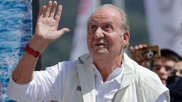 Spain’s scandal-hit former king postpones second trip home
