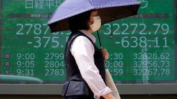Asian shares slip after rate jitters pull Wall Street lower
