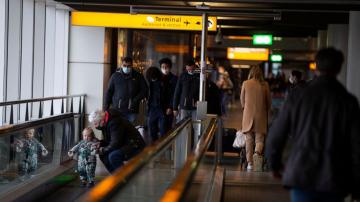 Dutch airport Schiphol to cut flights over busy summer