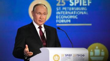 Putin: Russian economy to overcome 'reckless' sanctions