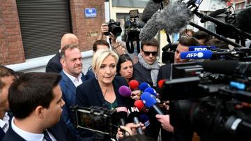 France awakens to an emboldened Le Pen after far-right gains