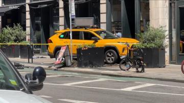 Police: 3 critically hurt when taxi jumps curb on Broadway
