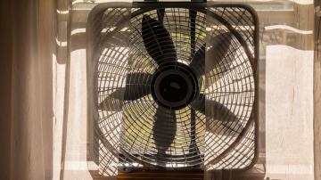 How to Tell Whether Your Window Fan Should Be Facing In or Out