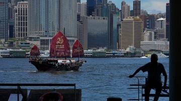 Hong Kong burnishes China ties as luster as global hub fades