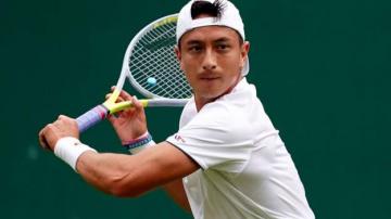 Wimbledon: Ryan Peniston makes winning start against Henri Laaksonen