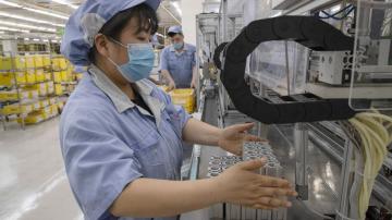 China's factory activity improves after Shanghai reopens