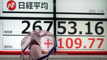 Asian shares mixed after China says growth weakened in 2Q