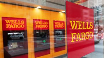 Wells Fargo profit falls buy loan growth buoys investors