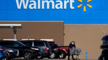Walmart cuts profit outlook as shoppers adapt to inflation