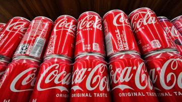 Coke revenue rises along with prices; ups outlook for 2022