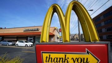 McDonald's reports lower Q2 sales, charges weigh down profit