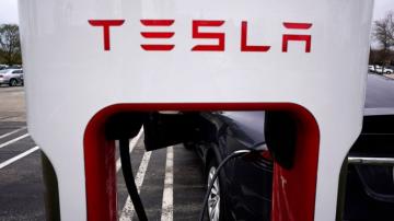 Tesla investors approve stock split; Musk to add factories