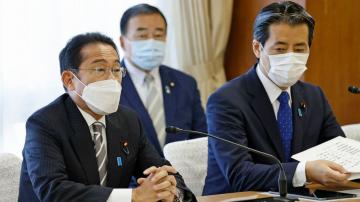 Japan PM to name new Cabinet, shifting some over church ties