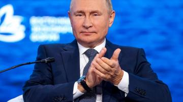 Putin mocks West, says Russia will press on in Ukraine