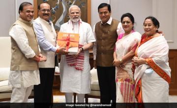 PM Modi Receives Braille Version Of Assamese Dictionary 'Hemkosh'
