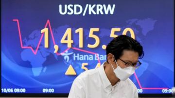 Asian stocks mixed on strong US hiring, OPEC oil output cuts