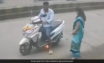 Watch: Bystanders Jump Into Action As Scooter Catches Fire
