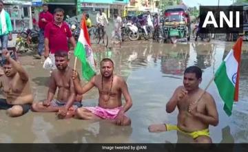 To Protest Potholes, Bihar Villagers Sit On Flooded Highway