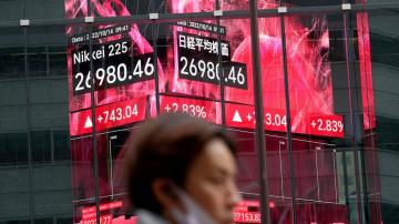 Asian shares fall after weak earnings pull Wall St lower