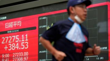 Asian shares mixed; Chinese economy grew 3.9% in July-Sept