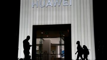 2 Chinese officers charged in plot to obstruct Huawei probe