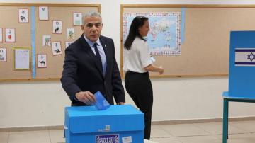 Israelis vote for 5th time in 4 years, with turnout surging