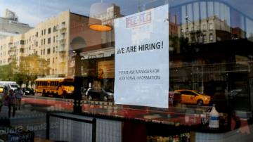 US hiring stayed strong in November as employers add 263,000 jobs