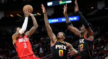 NBA Roundup: Ayton hurt, slumping Suns drop fifth straight to Rockets