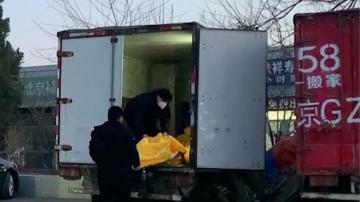 COVID-linked deaths seen in Beijing after virus rules eased
