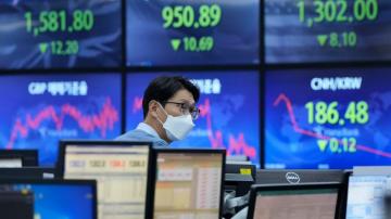 Asian markets follow Wall Street lower amid gloomy outlook