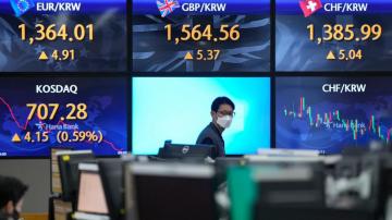 Asian shares mixed as recession worries temper Wall St gains