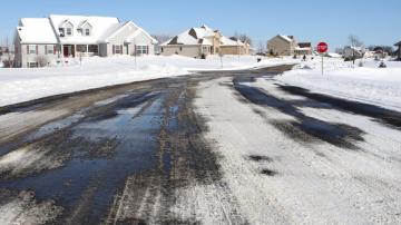 How to Get Rid of (and Prevent) Black Ice on Your Driveway and Walkways