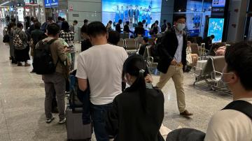 China to start issuing new passports as virus curbs ease