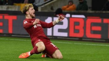 Elliott stunner fires Liverpool into fourth round