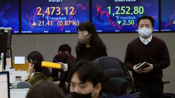 Asian shares mixed after Wall St gains on Fed chair comments