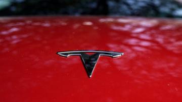 Tesla says production innovation to cut auto costs by half