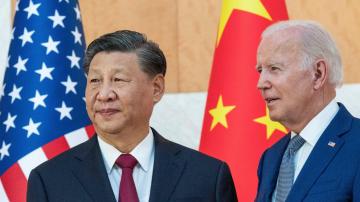 China accuses Washington of trying to block its development
