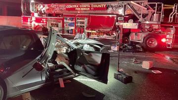 Feds investigating fatal crash where Tesla plowed into parked firetruck