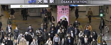 Masks stay put in Japan as 3-year request to wear them ends