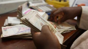 Nigeria's old currency can be used longer amid cash crisis