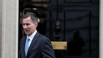 UK Treasury chief seeks drama-free budget day amid strikes