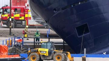 Ship dislodges, tips over in Scotland dry dock; 25 injured