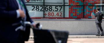 Asian shares mixed as surging oil prices fan inflation fears