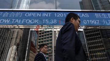 Asian shares moderately higher with focus on inflation data